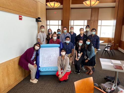 MELT-Trainees with white board
